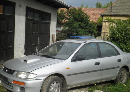 dezmembrez mazda 323 1,7 td 1996