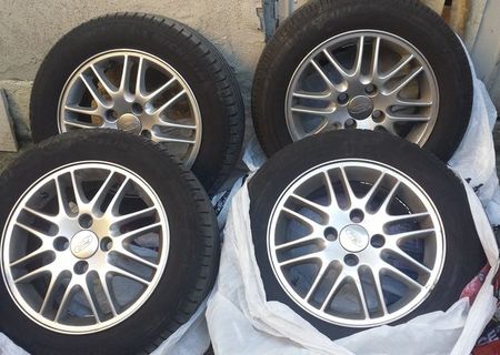 Jante  ROTI aliaj ORIGINALE FORD 4 buc 15"+anve 195/60 R15