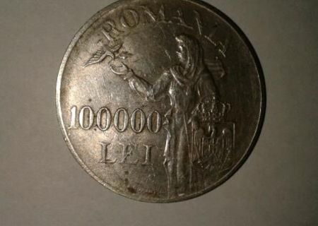 moneda veche de argint din 1946 cu capul regelui Mihai si este de 100000.