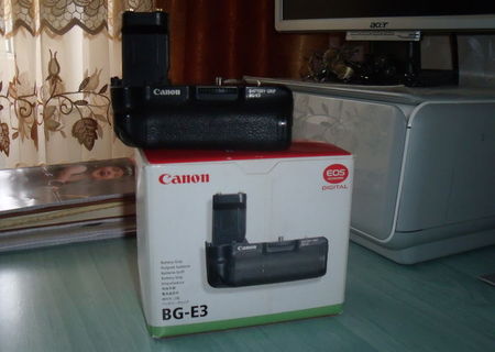 SCHIMB Grip Canon  cu obiectiv