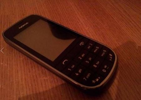 Vand Nokia Asha 203