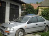 dezmembrez mazda 323 1,7 td 1996