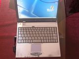 Vand Laptop SOTEC 14' perfect functional cu Windows XP